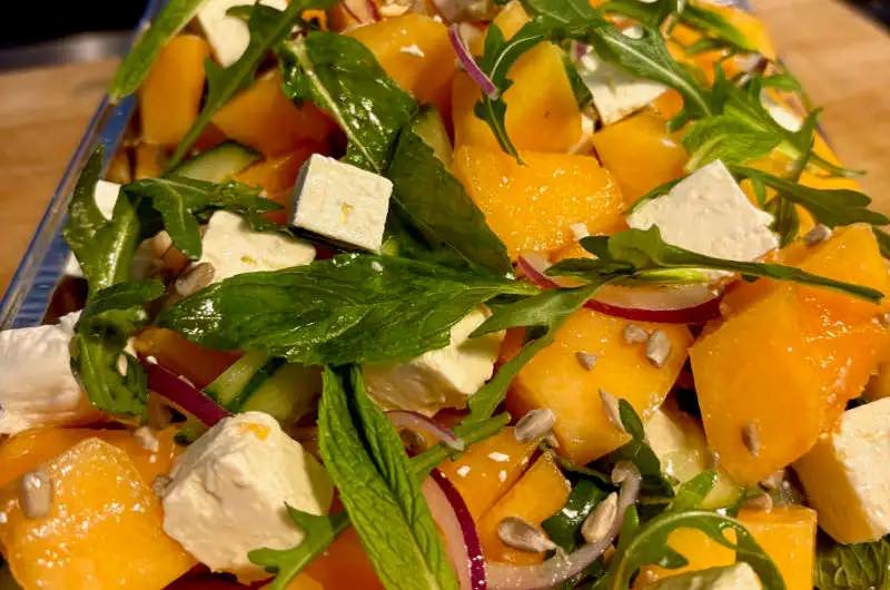 Here’s my Melon and Feta Salad – absolutely divine, fresh, and bursting with flavour. It pairs perfectly with my Chipotle Raspberry Vinaigrette (you’ll find that on my website and profiles), and it also goes beautifully alongside pork or chicken. This is your next go-to summer salad, no doubt about it!

Ingredients
1 melon of your choice, deseeded, peeled, and cut into bite-sized pieces
1⁄2 cucumber, halved and finely sliced
1⁄4 red onion, finely sliced
1⁄4 cup sunflower seeds
1 block of feta, cut into chunky cubes
A good handful of rocket
Olive oil, for dressing
Salt and cracked black pepper, to taste

Instructions
Prepare all your ingredients as above.
Grab a large bowl and toss in the melon, cucumber, red onion, sunflower seeds, feta, and rocket.
Drizzle with a good splash of olive oil, season with salt and cracked black pepper, and give everything a mix.
Transfer to a serving dish or container and keep it in the fridge until needed.

#SummerFoodIdeas #MelonAndFetaSalad #SummerSalad