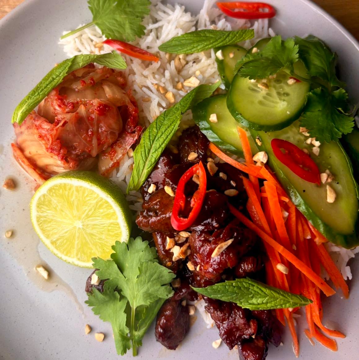 Tonight’s dinner was this bloody beautiful Korean Beef Fillet Salad, and I’ve got to tell you, it was absolutely banging.

The dressing was simple but packed with flavour – rice vinegar, fish sauce, a little palm sugar, gluten-free soy sauce, cracked black pepper, and a good squeeze of fresh lime juice. Fresh, tangy, salty, and bloody delicious.

For the beef fillet, I sliced it against the grain to make it even more tender, then marinated it for about 10 minutes in gluten-free soy sauce, a touch of bicarb to help tenderise it, cracked black pepper, honey, gochujang, sesame oil, and a splash of rice vinegar.

Cooked it hot and fast, served it over rice, then topped it with finely chopped roasted peanuts for crunch, fresh red chilli, coriander, and plenty of mint.

Honestly, this is one of those meals that tastes like you’ve ordered it from a restaurant, but it’s dead easy to make at home.

I don’t need to give you a recipe — you’ve already got it right here. If you’ve got any questions or want any tips, drop them in the comments and I’ll help you out. 🔥🥩🌶️

#GlutenFree #KoreanBeef #BeefFillet #EasyDinner  topfans