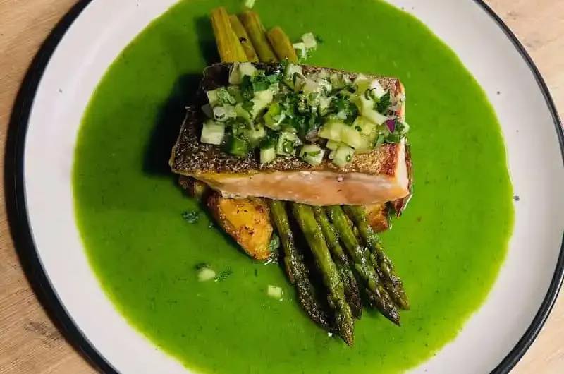 You wanna know how to cook salmon with that restaurant-style crispy skin? Let me show you how it’s done.

Pat dry the salmon fillets with paper towels to remove excess moisture. This ensures crispiness when cooking.

Score the skin of the salmon fillets with a sharp knife. Make shallow cuts to help the skin crisp up during cooking.

Season the salmon fillets with salt.

Heat a non-stick skillet over medium-high heat. 

Place the salmon fillets in the pan, skin side down. 

Press each fillet down to ensure an even cook.

Cook for approximately 4-5 minutes on the skin side until the skin is golden and crispy. Adjust the heat if needed to prevent burning.

Carefully flip the fillets and cook for an additional 2-3 minutes on the other side until the salmon is cooked to your liking.

Allow to rest for 3 minutes.

Enjoy your delicious Crispy Skin Salmon with your favorite sides! CheCooper.com 

#howtocooksalmon #crispyskinsalmon