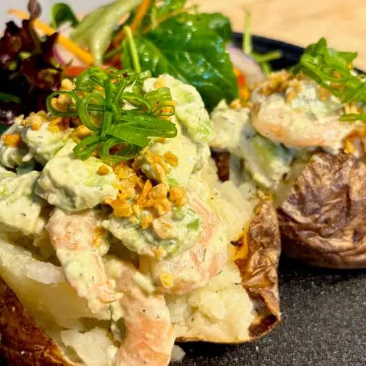 I bet you’ve got a bloody air fryer – because these days, every Tom, Dick, and Nancy seems to have one! So here’s how to whip up jacket potatoes in the air fryer: quick, easy, and absolutely delicious. Perfect all year round – summer, winter, as a simple dinner, or the ultimate side.

Ingredients
2 large floury potatoes (like Russet or Sebago)
1 tbsp olive oil
1 tsp sea salt (or to taste)

Instructions
Wash and scrub your potatoes well. Pat them dry with a clean tea towel.
Using a fork, prick each potato a few times to let the steam escape during cooking.
Rub each potato with olive oil until evenly coated.
Sprinkle with sea salt, making sure the skins are well seasoned.
Preheat your air fryer to 200°C (400°F).
Place the potatoes in the basket, leaving space around them for air circulation.
Cook for 35–45 minutes, turning halfway through, until the skins are golden and crispy and the insides are soft when pierced with a fork.
Slice open the tops, fluff up the insides with a fork, and add your favourite filling – like prawn and avocado, baked beans, or just a knob of butter.

#airfryerrecipe #jacketpotato