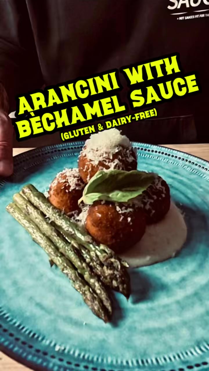 Let’s cook my gluten-free arancini with béchamel sauce.

Ingredients:
Arancini balls – from The Gluten-Free Lab in Perth
Asparagus or broccolini (optional)
Fresh basil, to garnish
Vegan Parmesan, to garnish
For the Béchamel Sauce:
50 g dairy-free butter (or normal unsalted butter)
2 g dairy-free cheese or normal (see my vegan parmesan recipe)
2 tbsp gluten-free plain flour (or regular plain flour)
500 ml almond milk (or full-fat milk)
Salt and cracked black pepper, to taste
A pinch of nutmeg (optional)

Cook the Arancini:
Grab your air fryer and check the Arancini packet instructions. These usually take about 12–15 minutes at 180°C.
Alternatively, you can bake them in the oven or deep-fry them if you prefer.

Make the Béchamel Sauce:
Get a medium-sized pan on low–medium heat and melt the butter.
Once it’s fully melted, add the flour and whisk well.

Keep whisking for 2–3 minutes to cook off the flour — this step gets rid of that raw flour taste.

Slowly pour in the almond milk while whisking continuously until it forms a smooth, velvety sauce.

Keep whisking until the sauce coats the back of a spoon.

Take it off the heat for a minute, then add the cheese bit by bit and whisk like hell!
Pop it back on low heat and season with salt, cracked black pepper, and nutmeg if using.

If your sauce is ready before your arancini, keep it warm on very low heat and give it an occasional whisk so it doesn’t form a skin.

To plate:
Spoon 3–4 tablespoons of Béchamel onto the plate and spread it into a circle.
Place your arancini on top (stack them if you like a bit of height).
Lay the asparagus or broccolini alongside.
Garnish with vegan parmesan (or regular) and a fresh basil leaf — or finely slice the basil and sprinkle it over the top.
And e presto — dinner is done. Simple, creamy, and delicious.

#glutenfreearancini #arancinirecipe #arancini #glutenfreerecipes