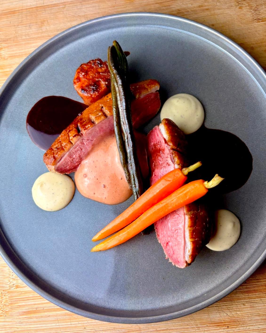 Last nights dinner I decided to be a bit fancy! 

Duck with celeriac & fennel puree, fondant sweet potato, snake beans infused with tamarind & soy, baby carrots, cherry & orange jus, plum foam.

All gluten-free & dairy-free.

#duck #finedining #glutenfree topfans